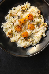 risotto mussels, vegetables (main course, rice seafood) menu concept. food background. top view. copy space
