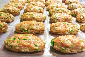 Raw sheftalia in a row close up