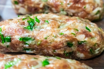 Raw sheftalia in a row close up