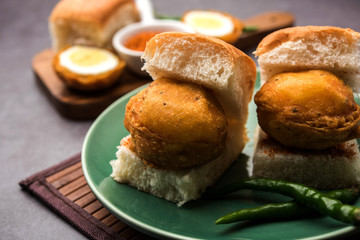 Egg Vada Pav or Anda  Wada Paav / Pao is a non-Vegetarian Fast Food Dish From Maharashtra, India