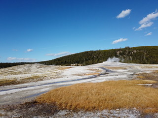 Old Faithful geyser erupting in Yellowstone National Park, WY