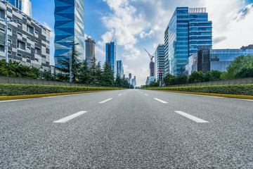 city road through modern buildings in nanjing