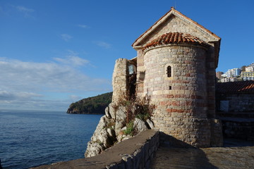 Fototapeta na wymiar Church on the shoreside in Budva