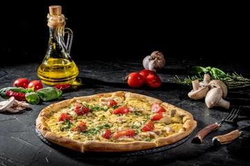 Fotobehang Tasty traditional italian pizza with salami, cheese, tomatoes greens on a dark background © Andrii