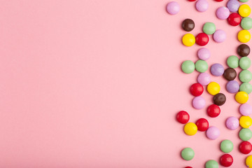 pink background with candy little multicolored