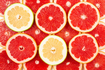 Pomelo and grapefruit slices background.