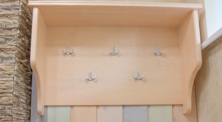 clothes hanger with shelf on top