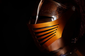 knight steel helmet dark background 