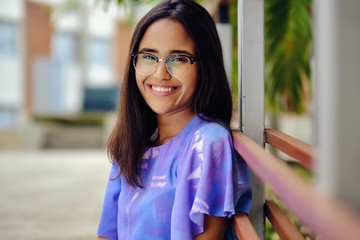 Smiling dominican 20 years old girl outdoor campus university