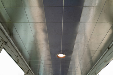 Recessed Lamp in a Metal Ceiling