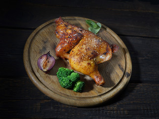 smoked chicken on a dark background