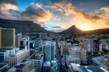 Fotobehang dramatische zonsondergang in Kaapstad © Tony