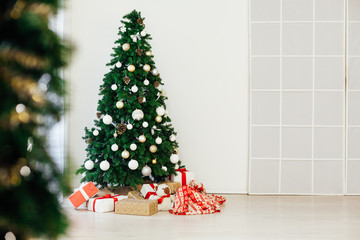 Christmas tree with gifts holiday new year interior decor as background