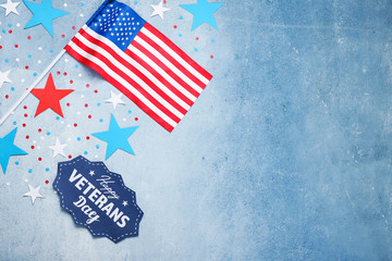 USA flag and text HAPPY VETERANS DAY on color background