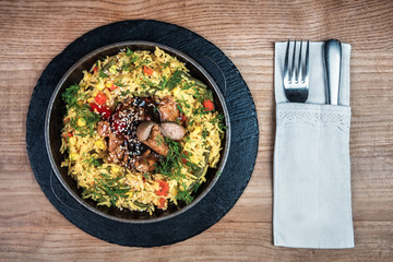 hot pan with delicious rice and meat