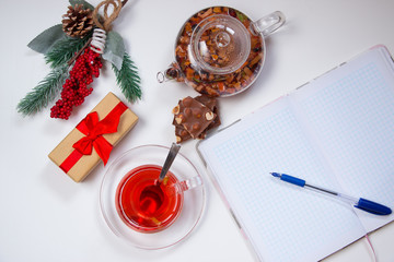 Christmas flat with fruit tea on a white background. Top view.