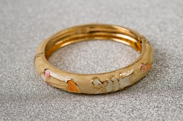 metal, round, women's multi-colored bracelets on a hand