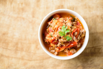 Northern Thai food (Nam Prik Ong), spicy chili minced pork with tomatoes, Thai chili paste 