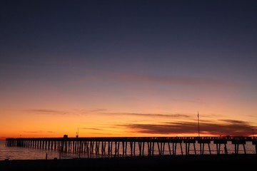 Fototapeta na wymiar Pier sunset Panama City Beach