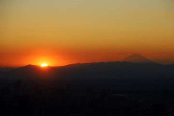 Beautiful city landscape looking view Fuji from Tokyo city in the sunrise or sundown colorful in the evening.