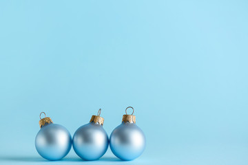 Fototapeta premium Beautiful Christmas balls on color background