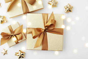 Christmas gift boxes and ornaments on white background