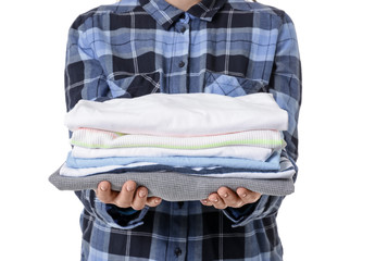 Young woman with clean clothes on white background, closeup