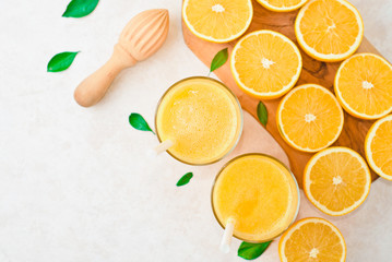 oranges for making juice, pattern, on a blue background