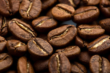 Coffee beans close-up background. Fresh roasted