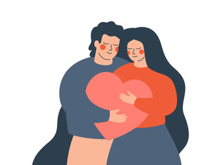 A young couple embraces each other with love and care. Happy woman and man hold a big heart together. Concept of the Valentine day and family day