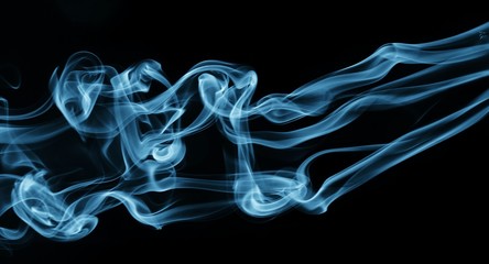 Obraz premium blue smoke on black background
