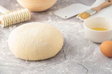 Fresh dough on the table with Ingredients. Copy space.