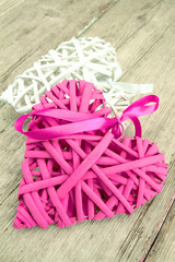 several wooden hearts on a wooden table	