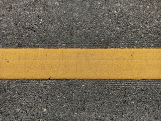 Fototapeta premium Yellow traffic line in Thailand
