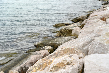 Rocks in the Beach of Mattinata with Cloudy Sky
