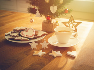 Christmas or New Year composition with gingerbread cookies, coffee and christmas decorations. Christmas decorations and coffee cup. 