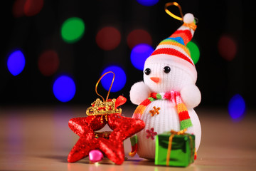 Festive snowman with Christmas light background