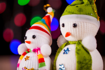 Festive snowman with Christmas light background