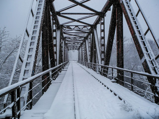 Rusty iron bridge in winter  
