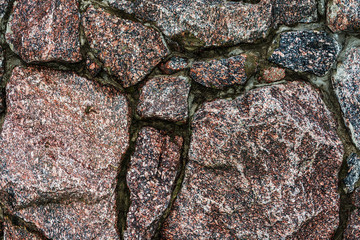 textured pattern of natural stone wall fragment