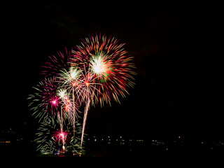 Colorful firework display at the International Fireworks Festival 2019 at Pattaya City, Thailand .