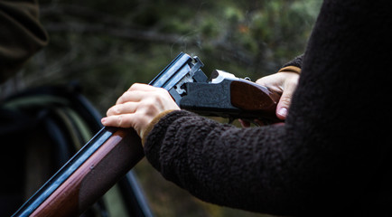 Smoking hunting gun or shotgun, clay pigeon shooting, Aviemore, Scotland, UK