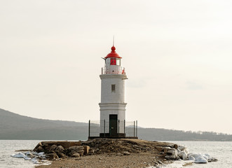 old abandoned lighthouse in the sea