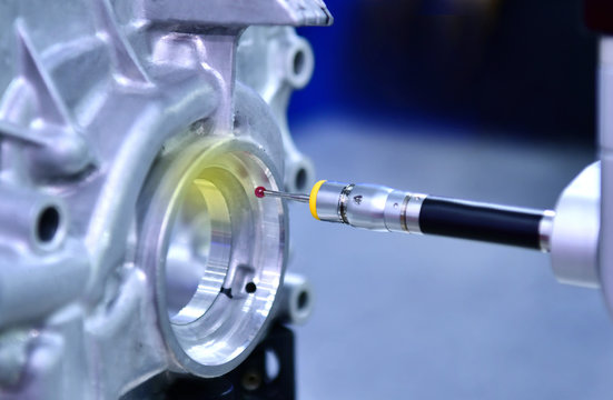 Close up automatic coordinate measurement machine (CMM) for inspection high precision part during working