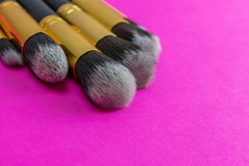 Obraz na płótnie Canvas Cosmetics brushes. Drawing products for skin with copy space. Be
