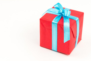 Gift box with ribbons and christmas decor isolated on white background. Happy birthday colorful gift