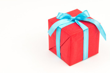 Gift box with ribbons and christmas decor isolated on white background. Happy birthday colorful gift