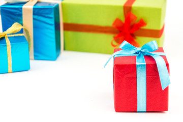 Gift boxes with ribbons and christmas decor isolated on white background. Happy birthday colorful gifts