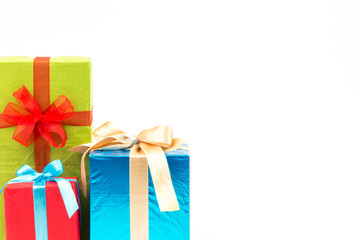 Gift boxes with ribbons and christmas decor isolated on white background. Happy birthday colorful gifts