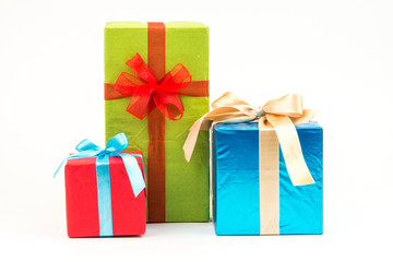 Gift boxes with ribbons and christmas decor isolated on white background. Happy birthday colorful gifts